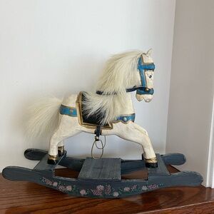 Miniature hand painted wooden rocking horse with real fur for Madame and tail.